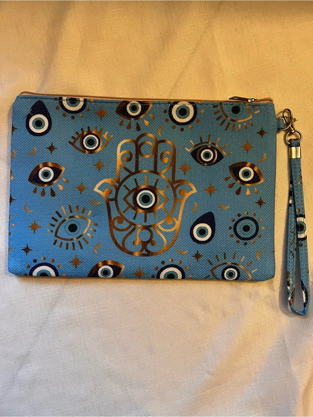 Blue Evil Eye Hamsa Wristlet Clutch with Gold Accents